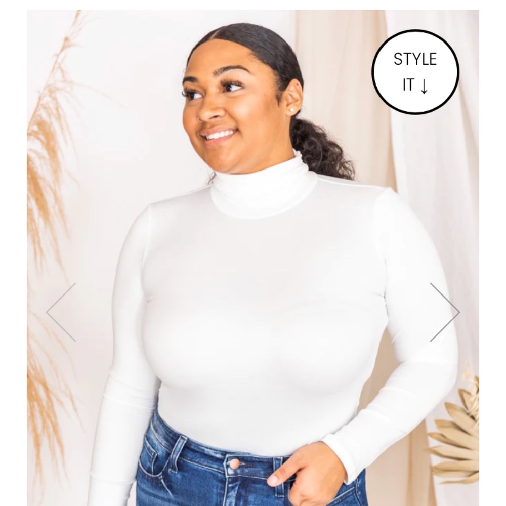 White turleneck body suit